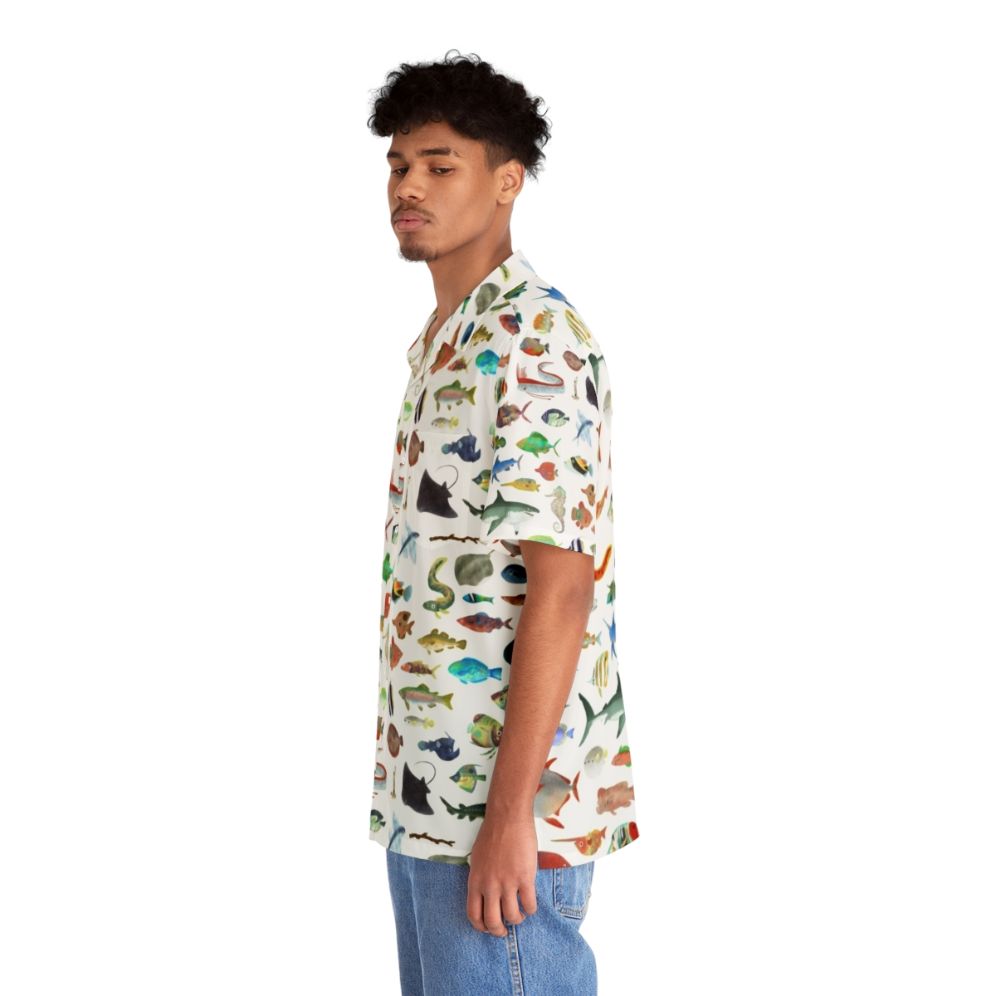 Colorful Hawaiian shirt featuring an ocean life design with tropical fish, sharks, and other marine animals - People Left