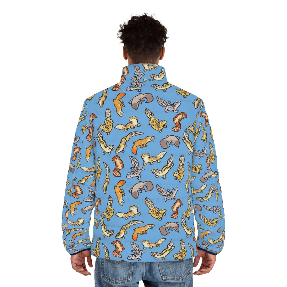 Chub gecko wearing a blue puffer jacket with a vibrant pattern - men back