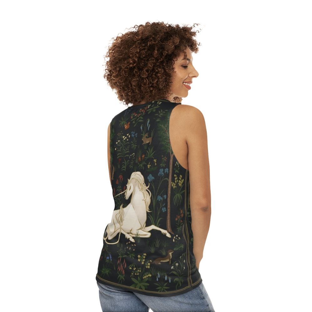 Unicorn in a fantasy woodland scene - women back