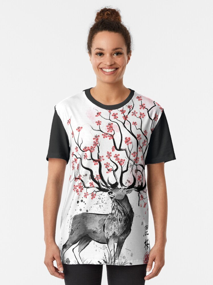 Minimalist graphic t-shirt featuring a sakura deer design in a watercolor sumi-e style - Women