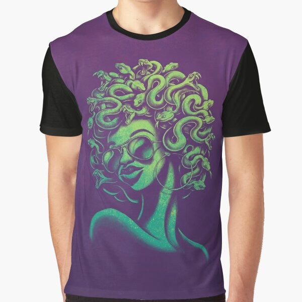 A funky and retro-inspired graphic t-shirt featuring the mythical Medusa character with an afro hairstyle and aviator sunglasses.