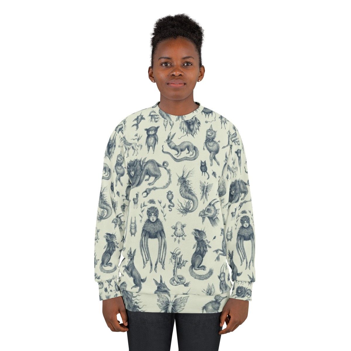 Sweatshirt with a pattern of mythical creatures like Bigfoot, Nessie, and dragons in a pastel, nature-inspired design - women