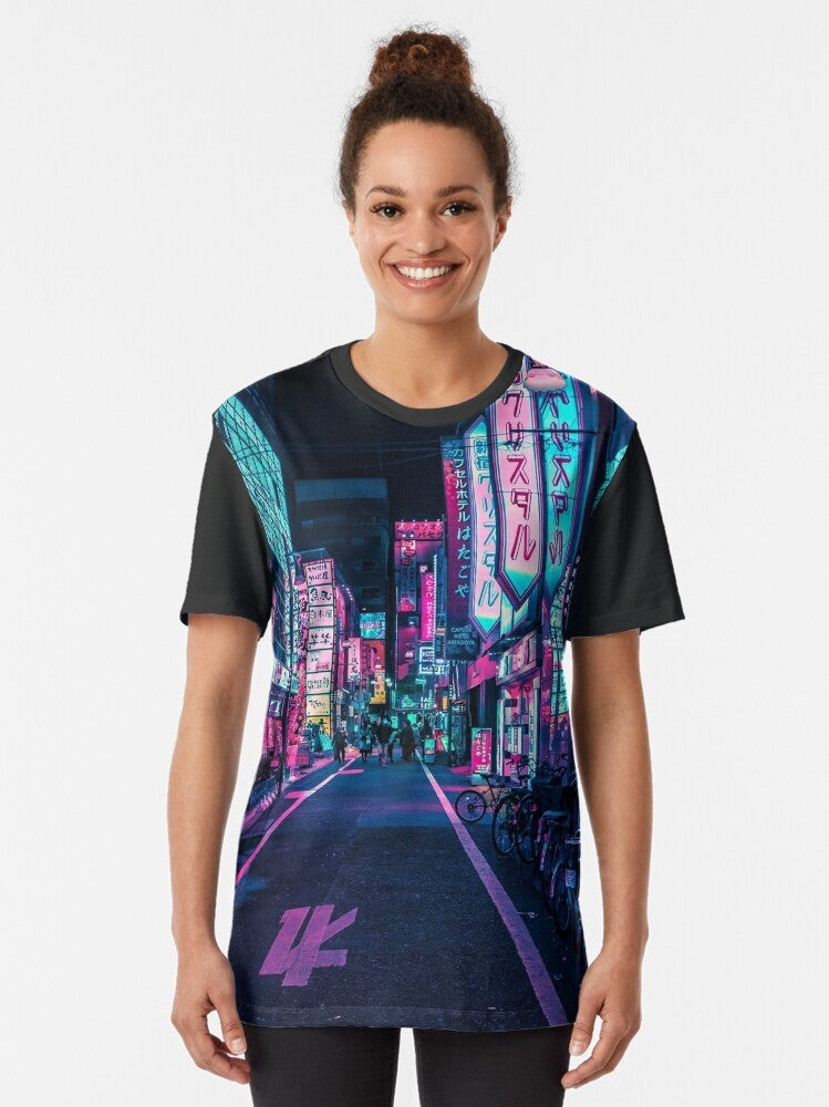 A graphic t-shirt featuring a neon-lit cityscape of Tokyo, with bright colors and a futuristic, cyberpunk-inspired design. - Women