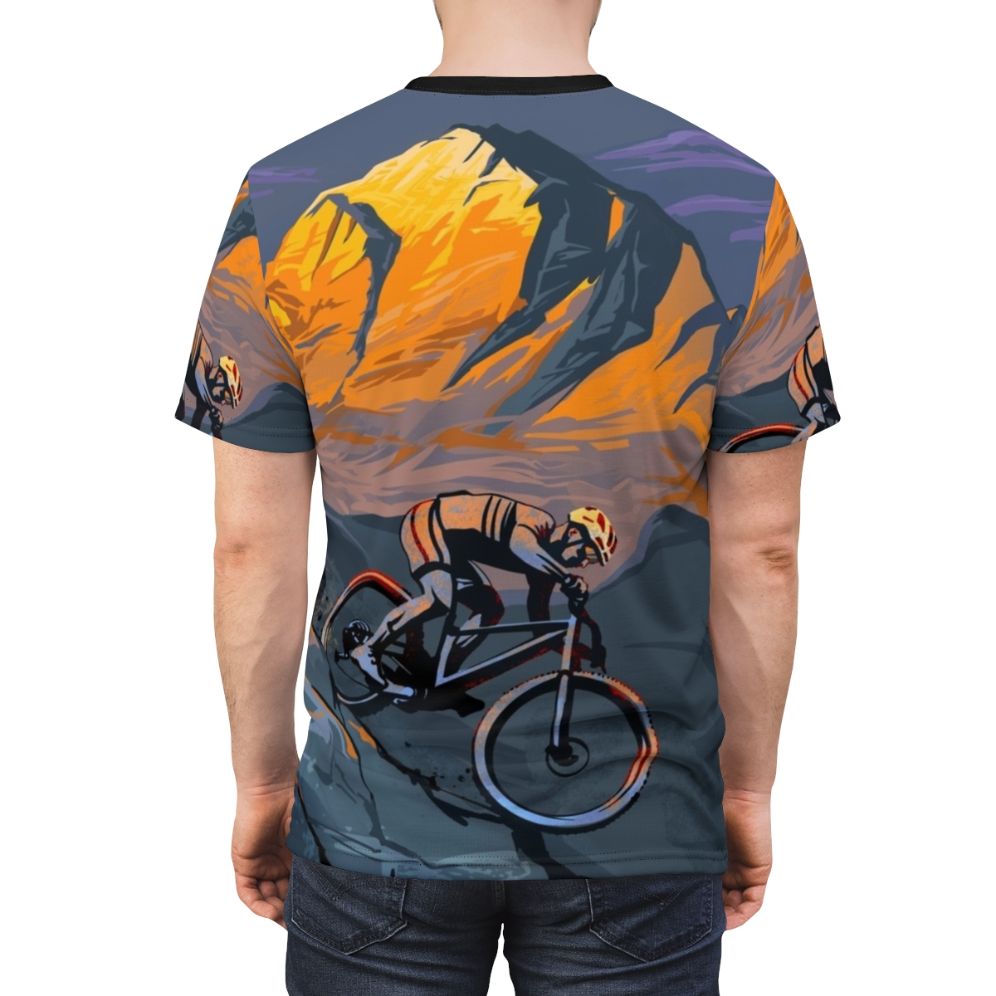 Mountain biker riding on a scenic trail with a sunset in the background - men back