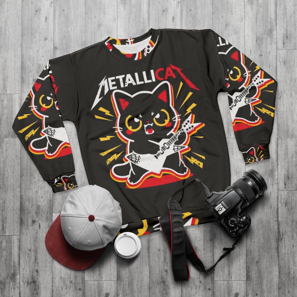 Metallicat metal sweatshirt with a cat pun design - flat lay