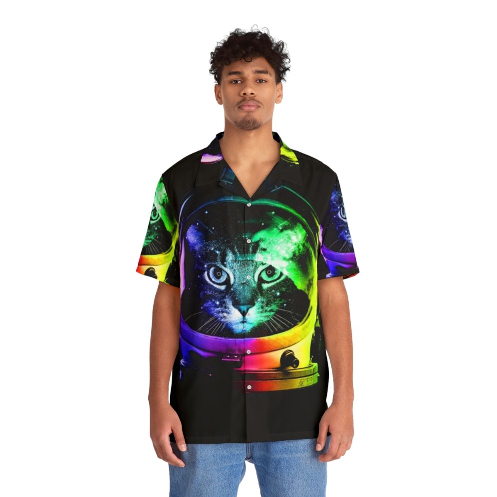 Astronaut cat wearing a colorful Hawaiian style shirt with a space and galaxy themed print - People Front