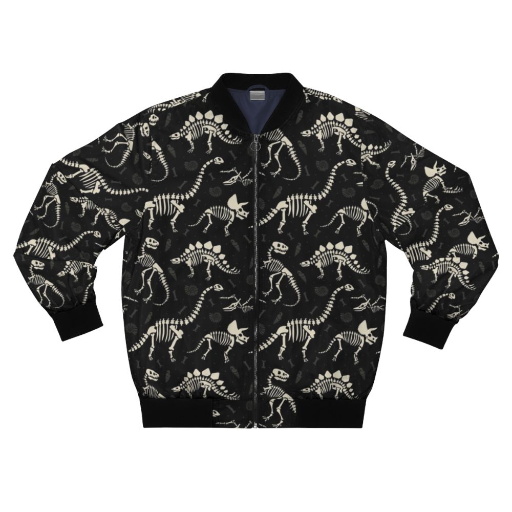 Black bomber jacket with a dinosaur fossil print design, featuring T-Rex, Triceratops, and other prehistoric creatures.