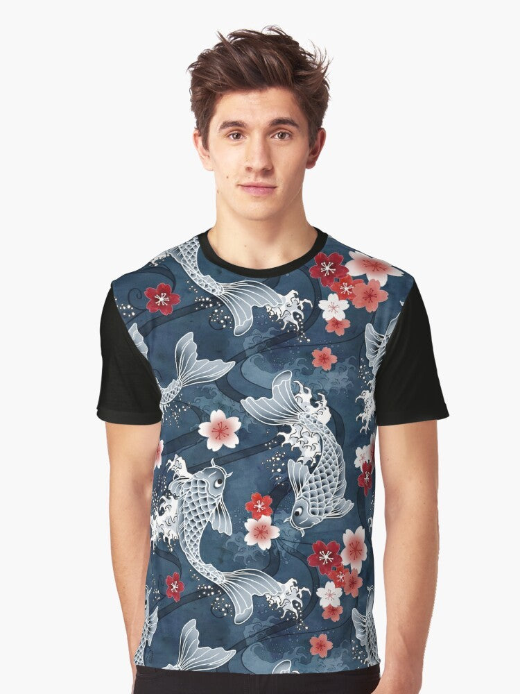 Graphic t-shirt featuring a koi fish swimming amidst sakura blossoms in a blue watercolor-style design - Men