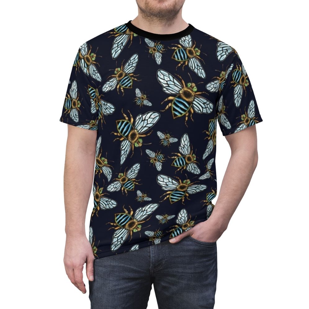 Model wearing a blue banded bee lino print t-shirt, a nature-inspired graphic design - men front