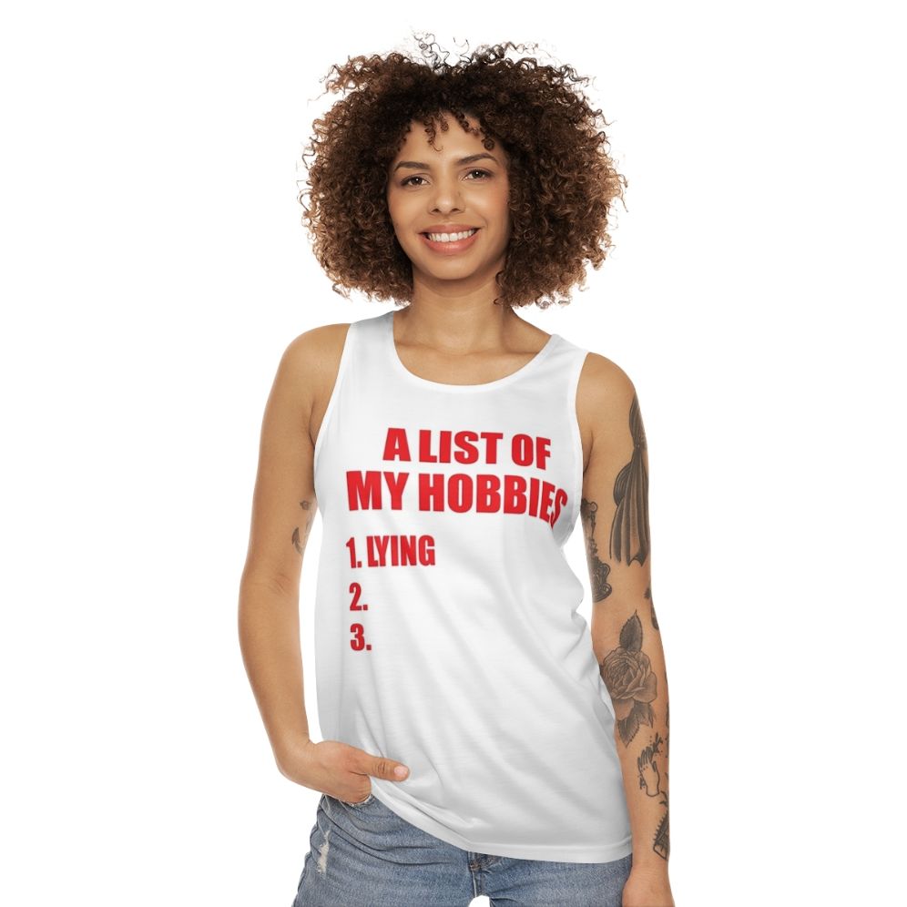 Unisex tank top with a list of hobbies lying design - women