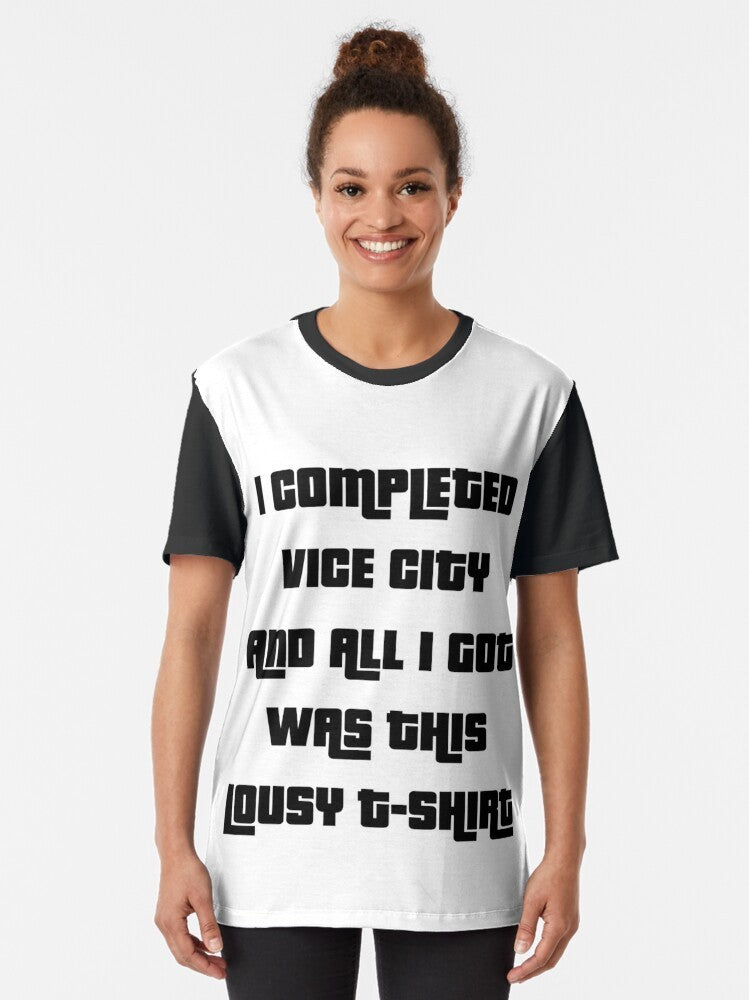 Retro-style graphic t-shirt with the text "I completed Vice City and all I got was this lousy blank" and a vaporwave-inspired design. - Women