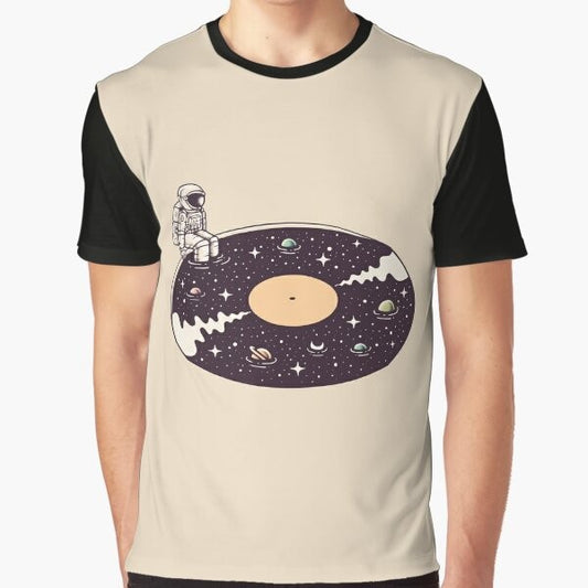 Cosmic Sound Graphic T-Shirt featuring a surreal design of an astronaut, stars, planets, and vinyl record