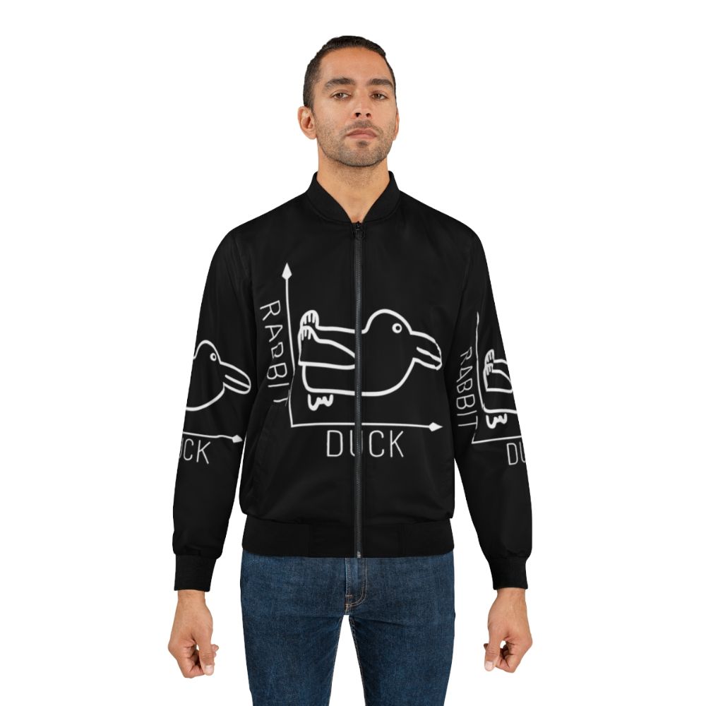 A bomber jacket featuring the famous Wittgenstein rabbit-duck illusion, representing the philosophical concept of perspective and language. - Lifestyle