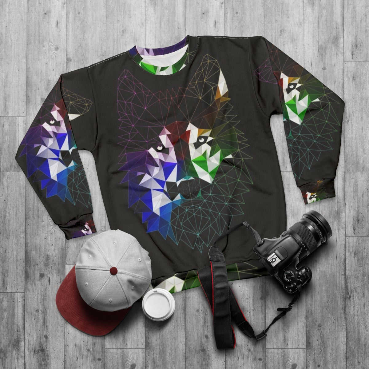 Geometric abstract wolf design on a grey sweatshirt - flat lay