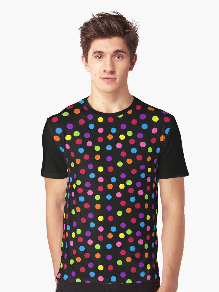 A black t-shirt with a colorful rainbow polka dot pattern graphic design. - Men