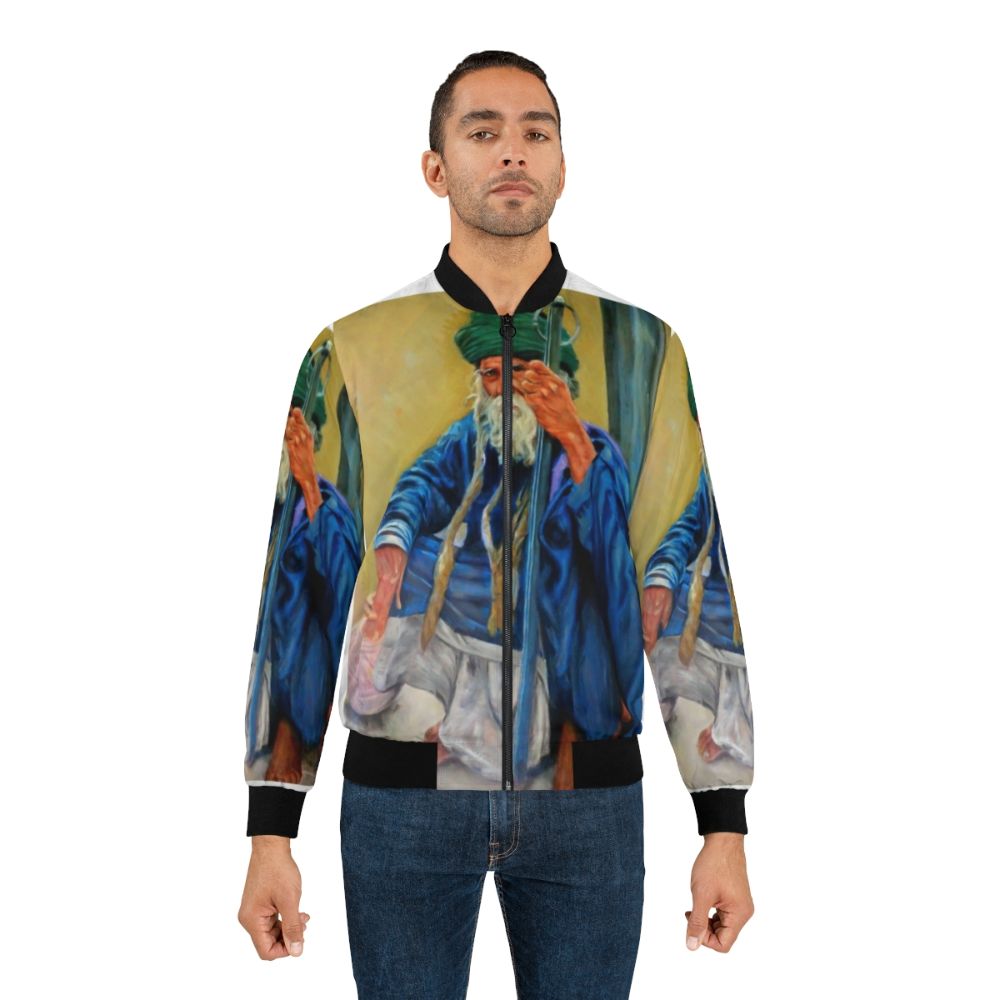 Indian man wearing a bomber jacket with a portrait design - Lifestyle