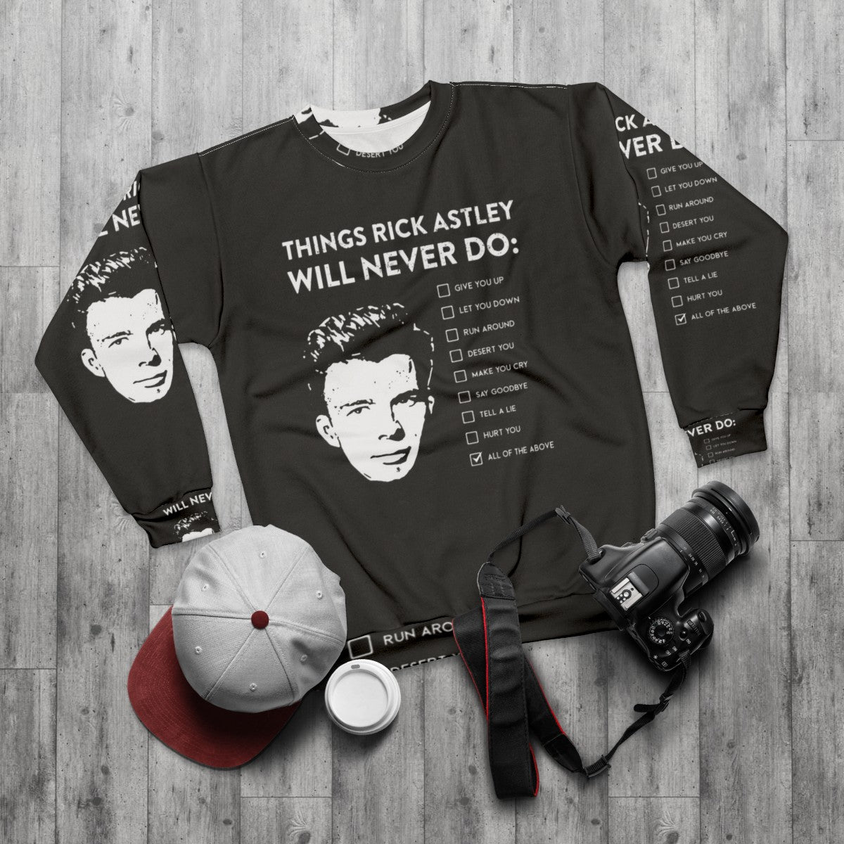 "Things Rick Astley Will Never Do" Sweatshirt featuring a Rick Astley meme - flat lay