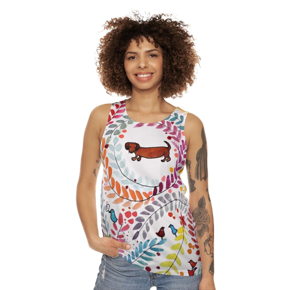 Dachshund-themed unisex tank top with colorful floral and bird pattern - women