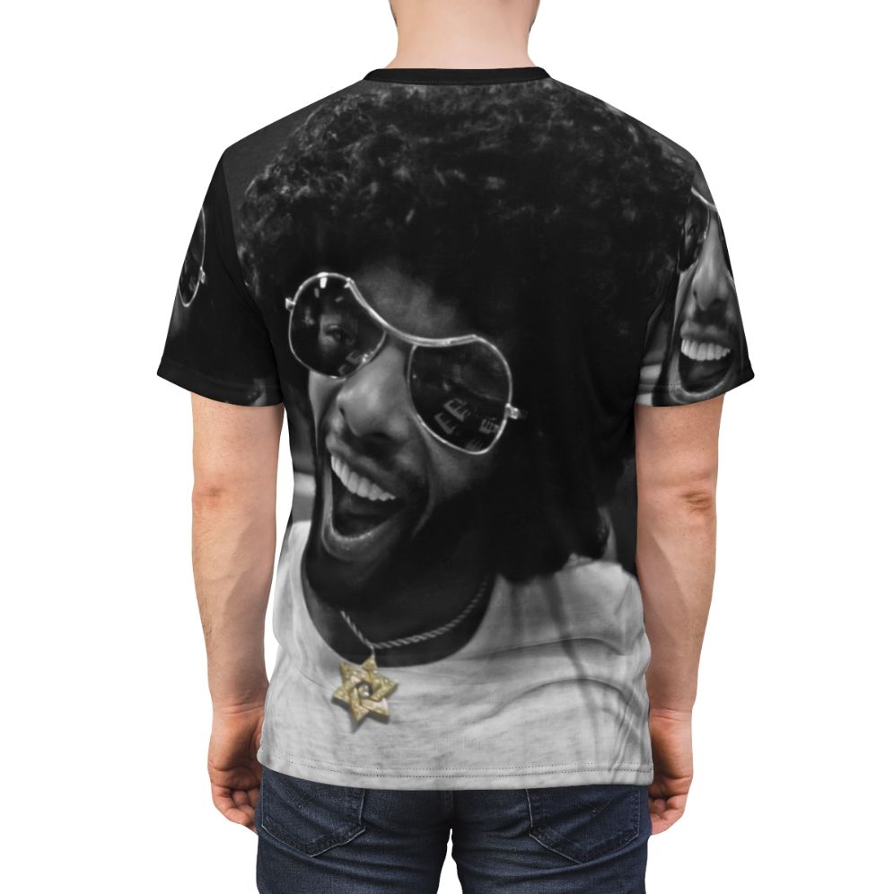 Artistic Tribute to Sly Stone's Music Studio AOP T-Shirt featuring black and white photography, selective color, and music-inspired elements - men back