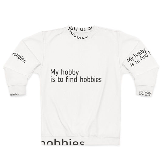 A person wearing a sweatshirt that reads "My Hobby Is To Find Hobbies"