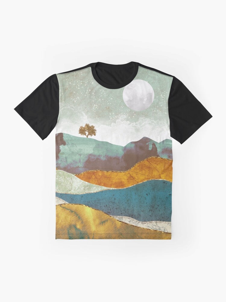 A graphic t-shirt featuring a stunning night fog landscape with a celestial atmosphere of stars, moon, and clouds. - Flat lay