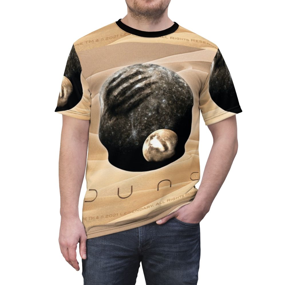 Graphic t-shirt featuring a design inspired by the science fiction film Dune, with imagery of a desert planet and its moons. - men front