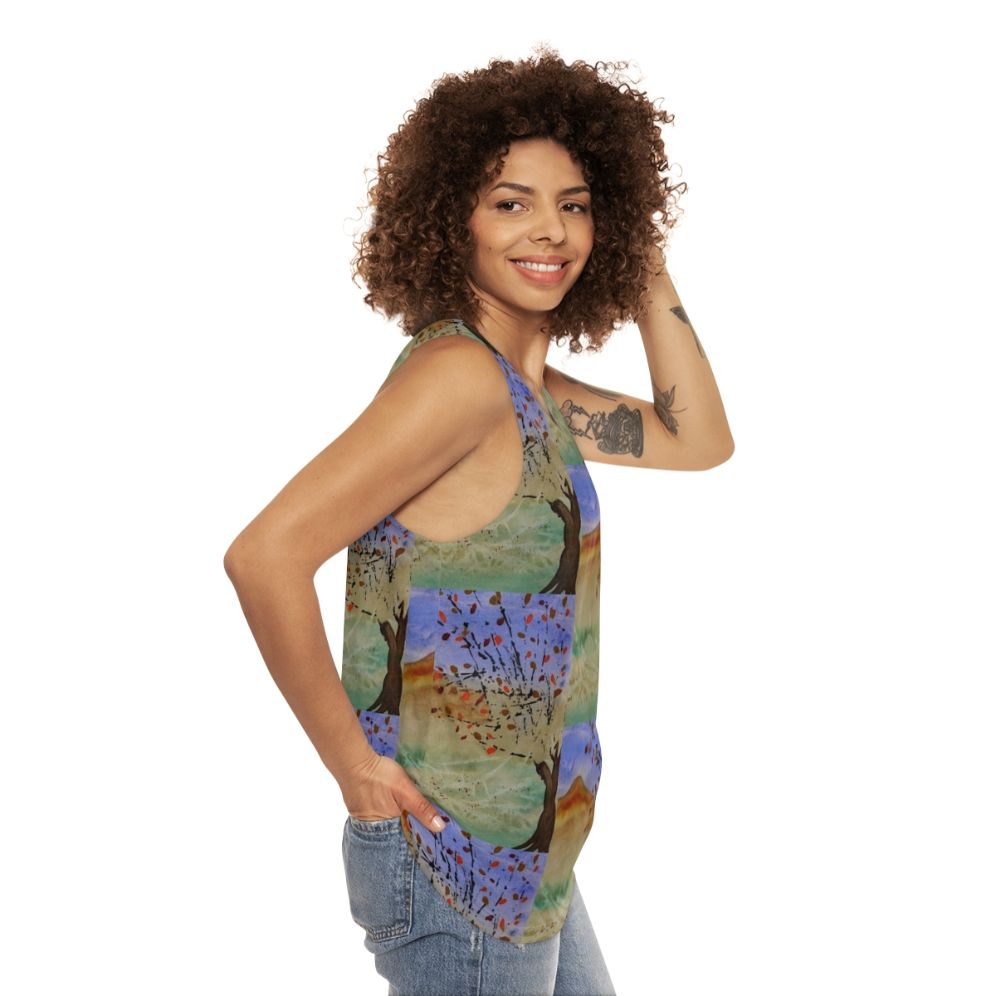 Windswept unisex tank top featuring a scenic landscape - women side