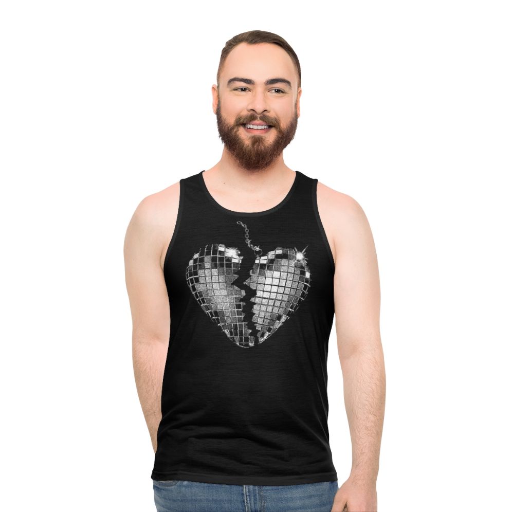 Unisex pop music tank top with "Nothing Breaks Like A Heart 3" design - men