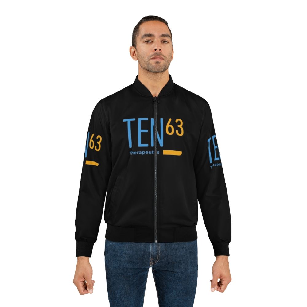 Vintage-inspired bomber jacket in Ten63 original colors with a dark background - Lifestyle