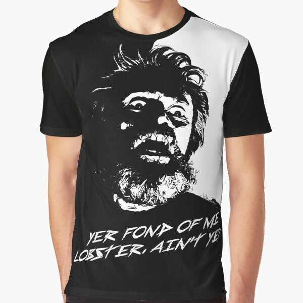 A graphic t-shirt featuring a lobster in a lighthouse, with references to the film "The Lighthouse" and its stars Willem Dafoe and Robert Pattinson.