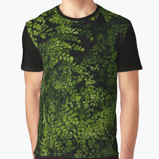 Graphic tee featuring a design of tropical leaves and nature elements