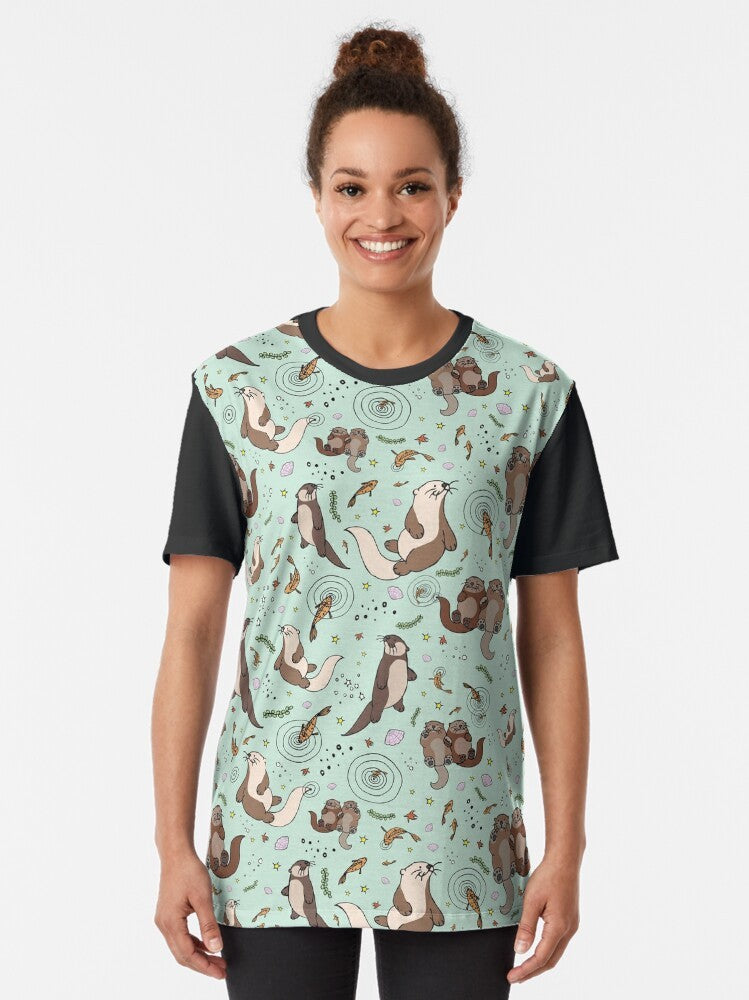 A cute and colorful graphic design featuring a sea otter on a t-shirt. - Women