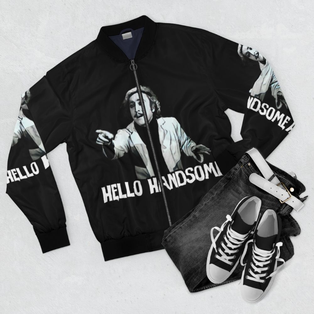 Retro 80s style bomber jacket featuring a Frankenstein and Mel Brooks pop art design - Flat lay