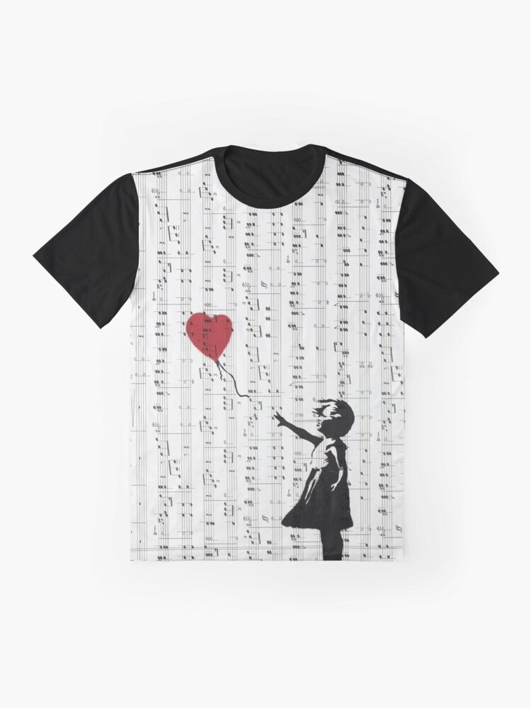 Banksy's iconic "Girl With a Red Balloon" street art design on a contemporary graphic t-shirt - Flat lay