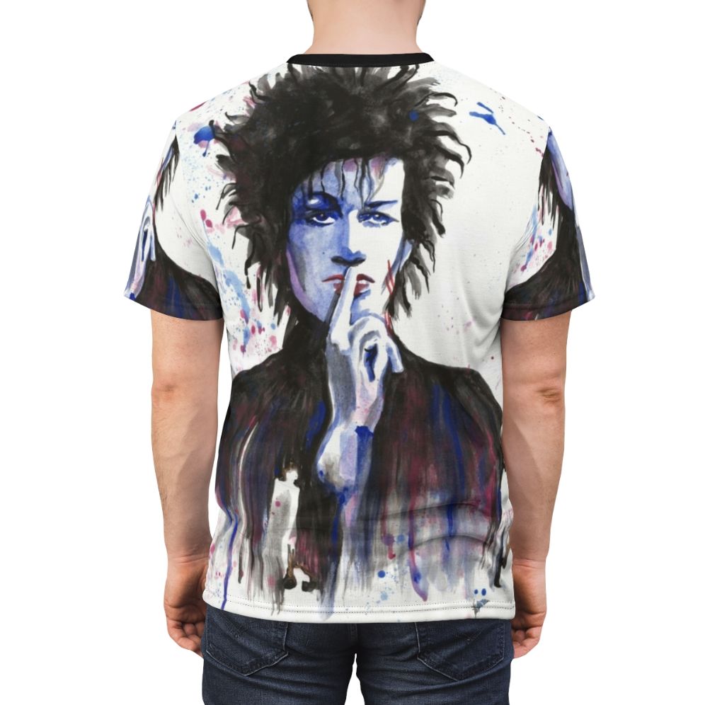 Watercolor-style t-shirt design featuring the image of Daniel Ash, the musician known for his work with the band Bauhaus - men back