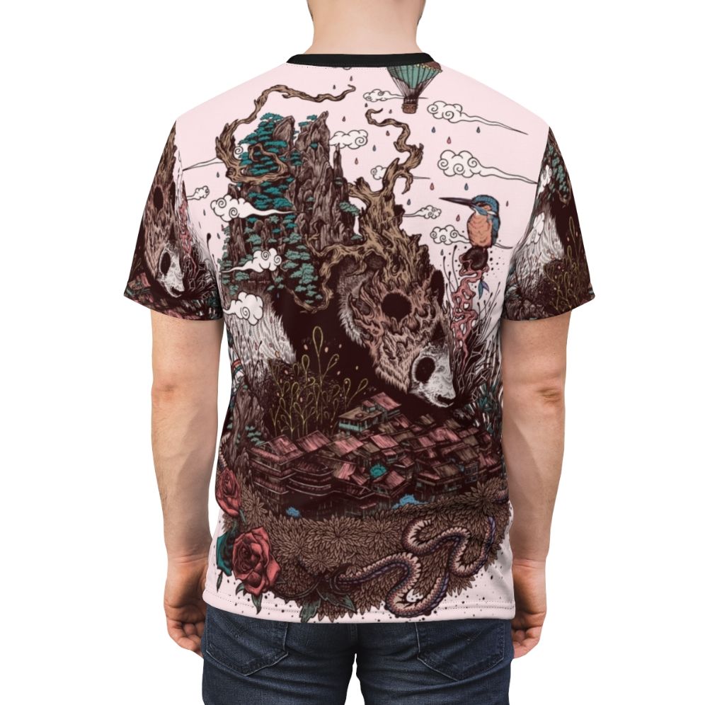 Closeup of a detailed nature illustration design featuring a panda bear, mountains, autumn leaves, and other natural elements on an all-over print t-shirt. - men back