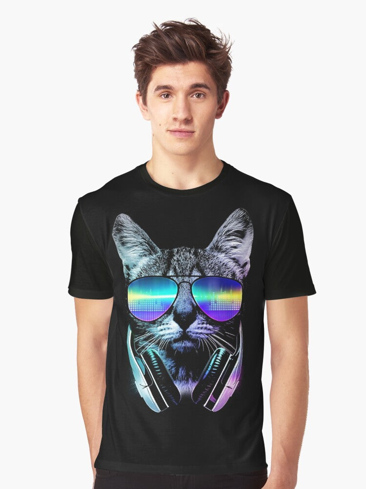 A stylish graphic t-shirt featuring a cool cat wearing headphones and surrounded by a music-inspired urban cityscape design. - Men