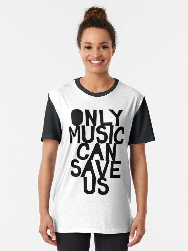 A black and white graphic t-shirt featuring the text "Only Music Can Save Us!" in a bold, hand-drawn typography style. - Women