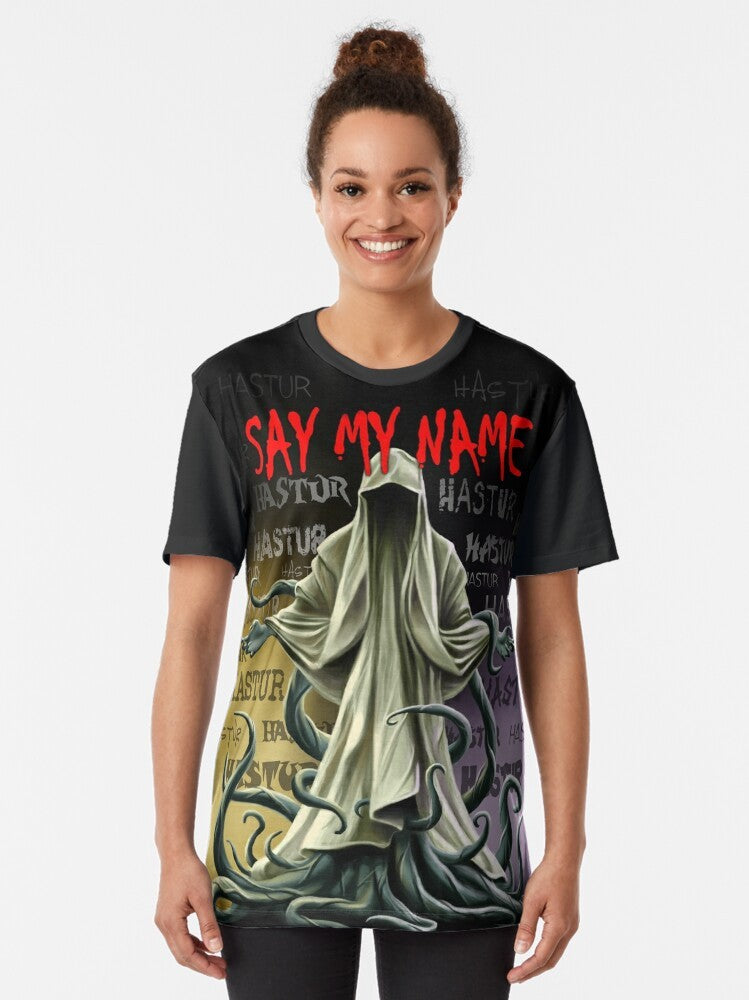 Hastur graphic t-shirt with text "Say My Name" in a dark, mysterious style - Women