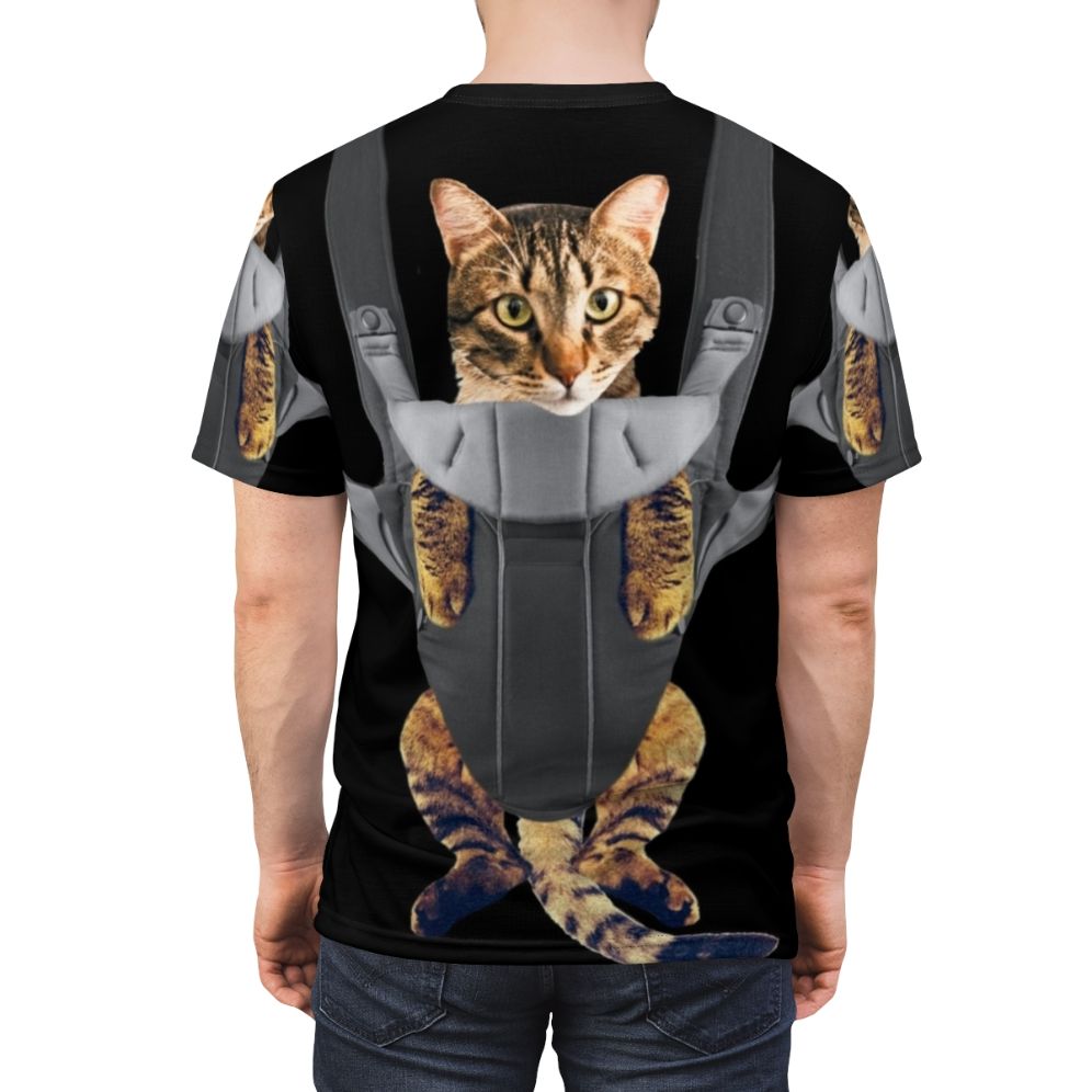 Mockup image of a t-shirt with a cute tabby cat sitting in a baby carrier - men back