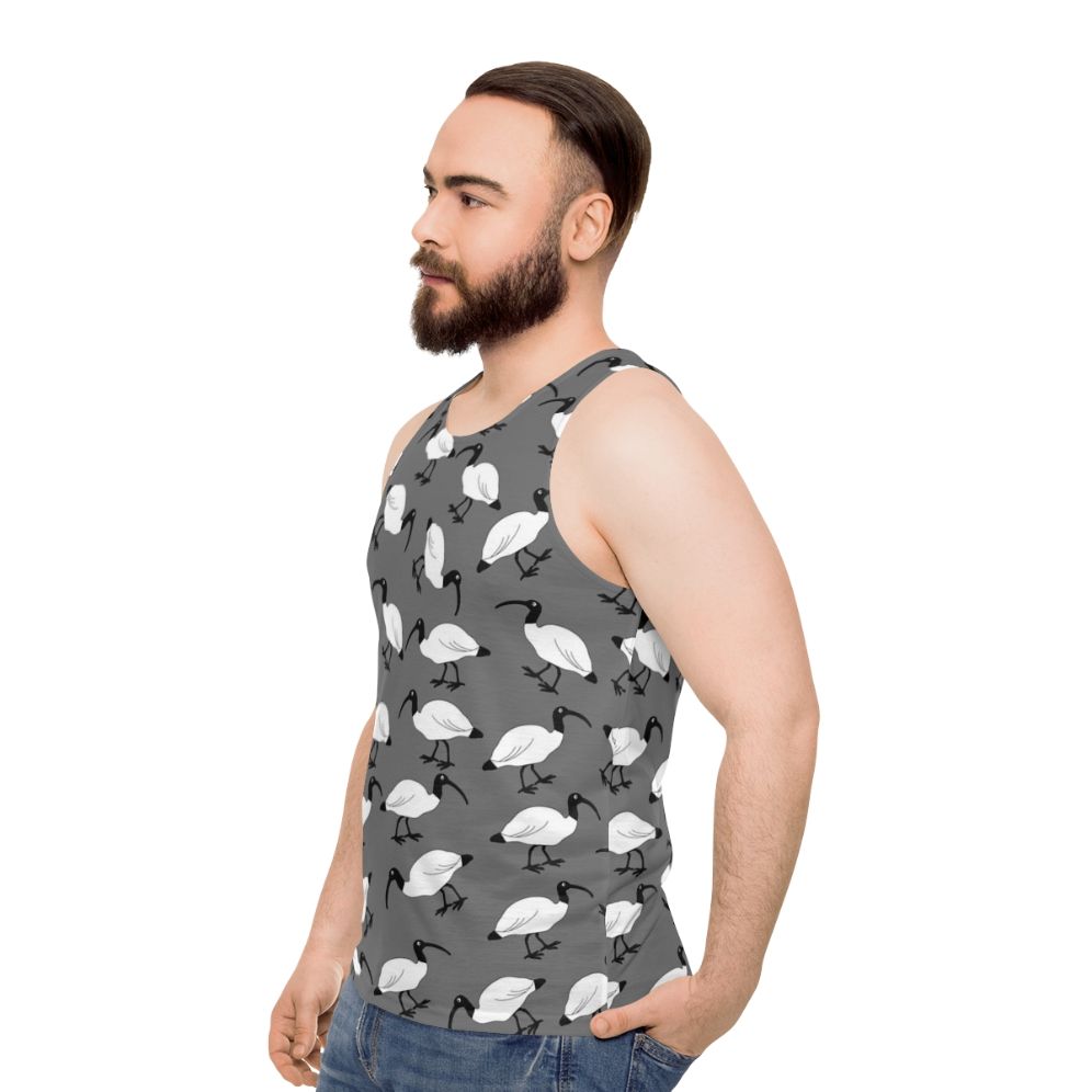 Unisex tank top with a digital print design featuring lots of bin chickens (ibis) scavenging in trash bins - men side