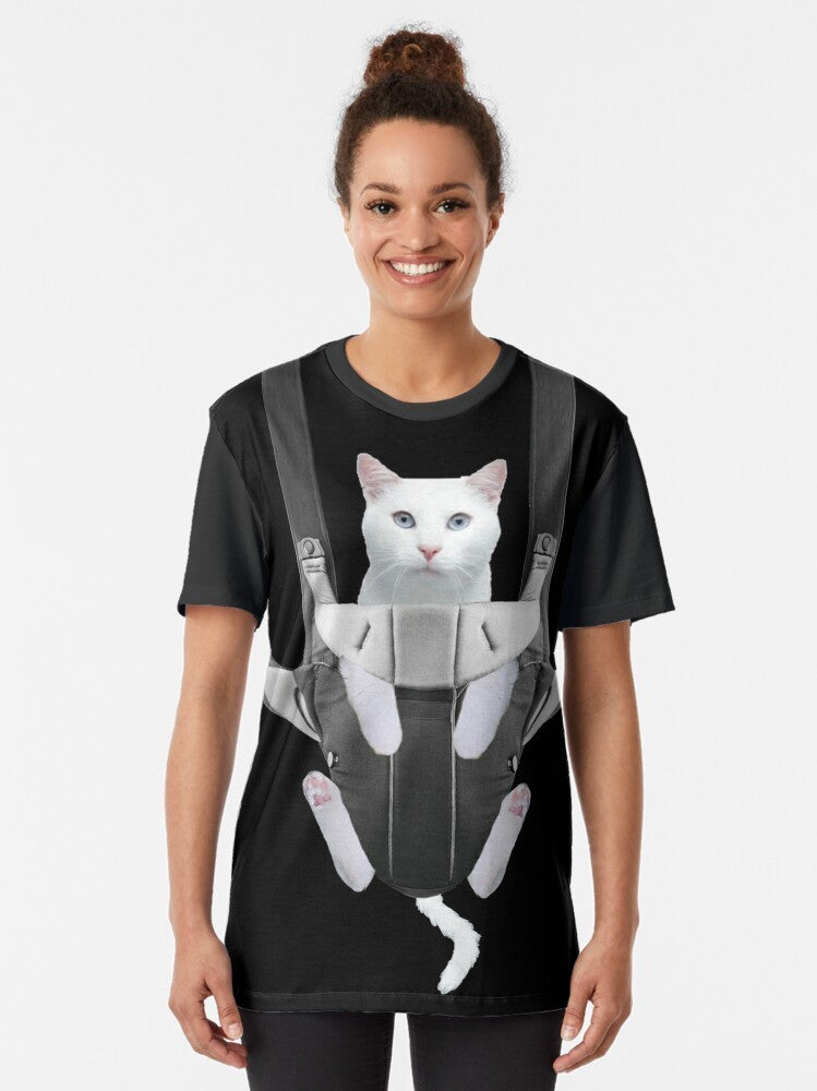 Adorable tabby cat snuggled in a baby carrier on a graphic t-shirt - Women