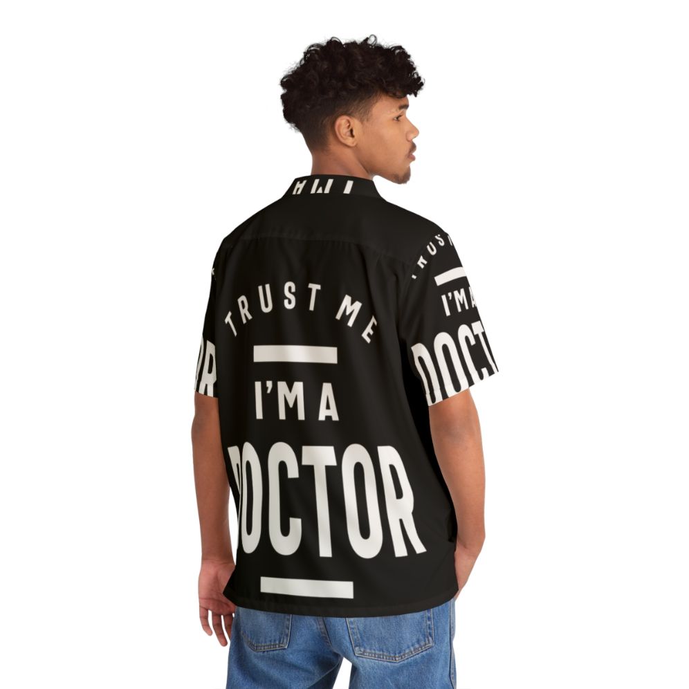 Doctor wearing a trust me I'm a doctor Hawaiian shirt - People Back