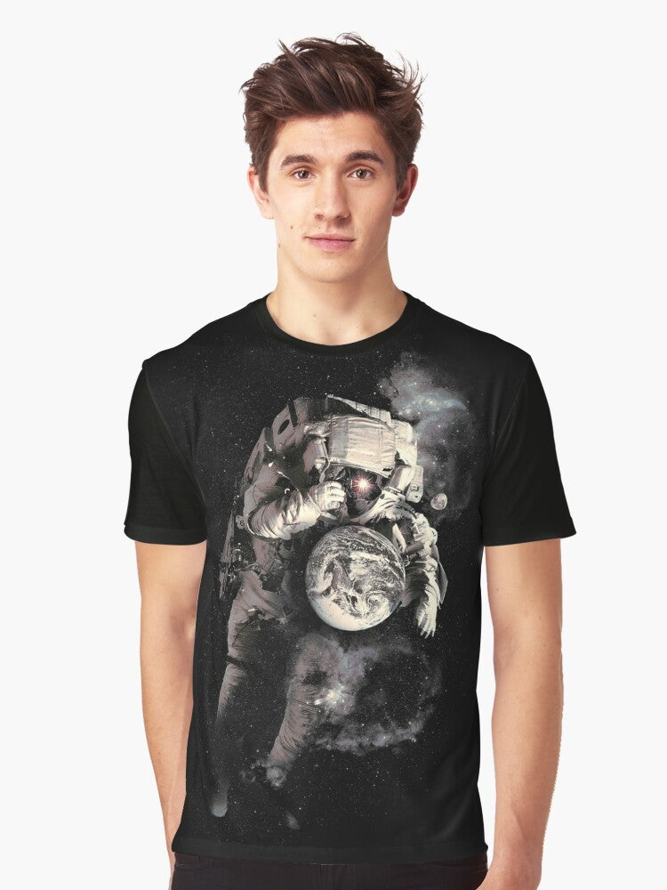 Cosmic Astronaut T-Shirt featuring a surreal graphic design of an astronaut in outer space - Men