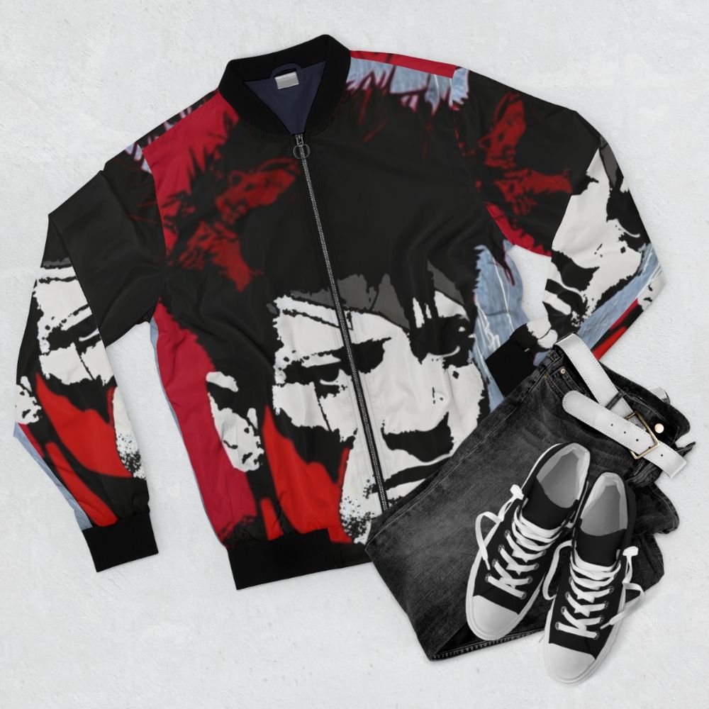 A bomber jacket with the image of the iconic Dutch musician, Herman Brood. - Flat lay