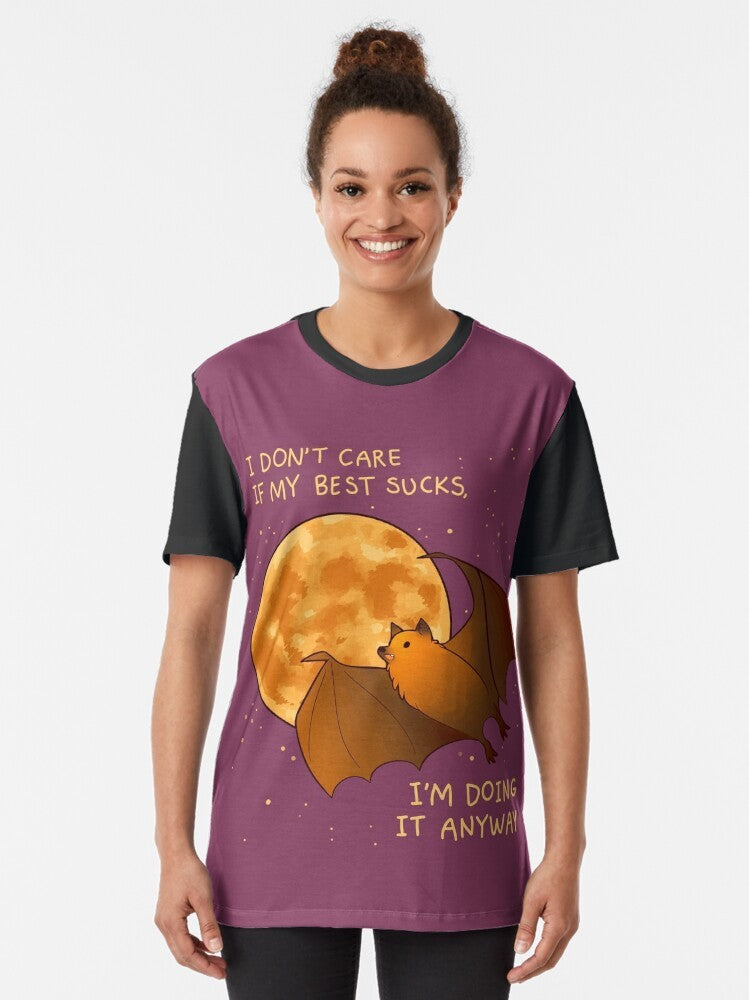 A t-shirt with a graphic design of a flying fox bat against a night sky filled with stars, representing mental health, encouragement, and self-care. - Women