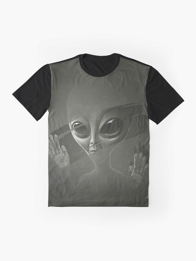 Alien graphic design on a black t-shirt, featuring a mysterious extraterrestrial creature in the cosmos. - Flat lay