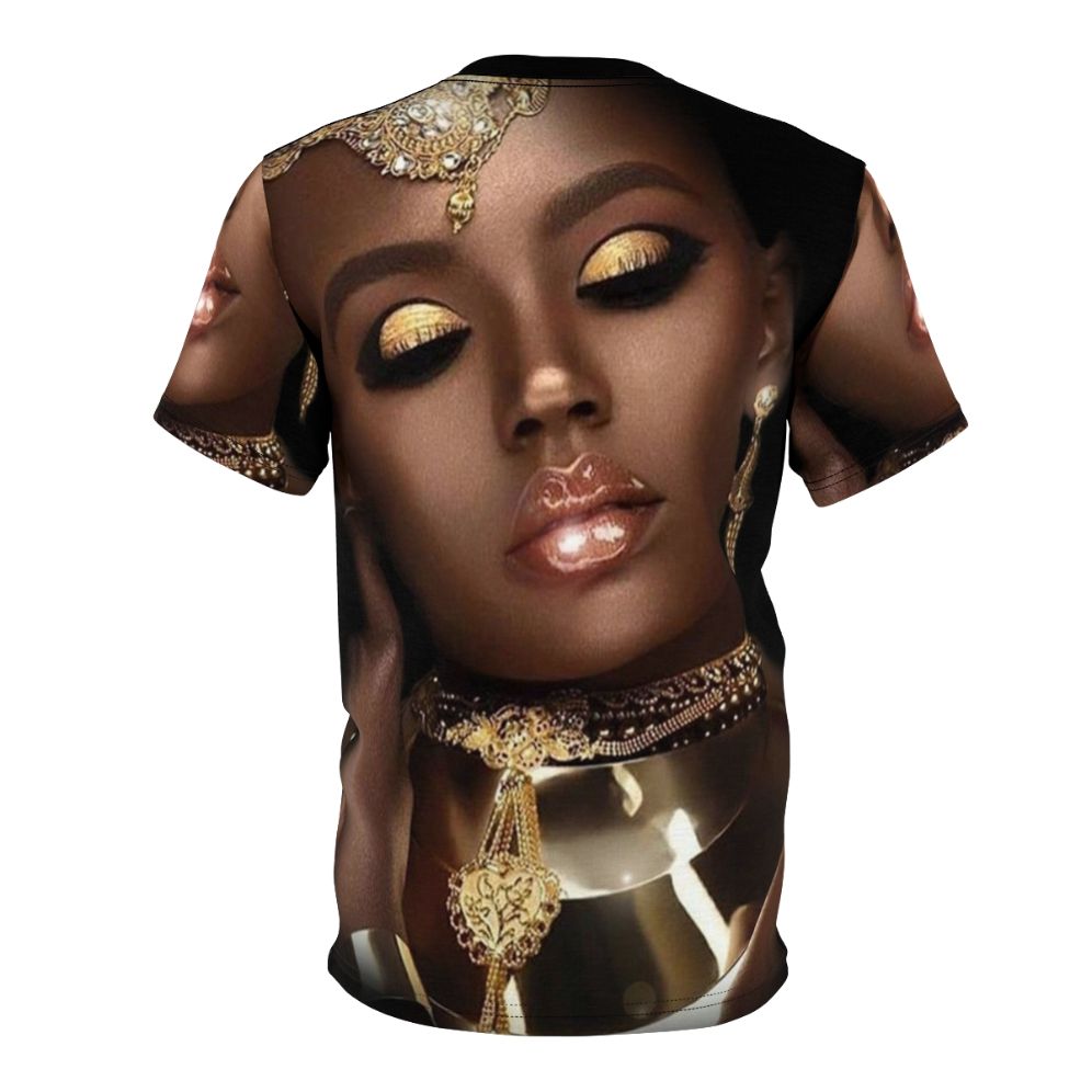 A vibrant and artistic t-shirt design featuring the face of an African queen or goddess with abstract patterns, jewelry, and cultural elements. - Back