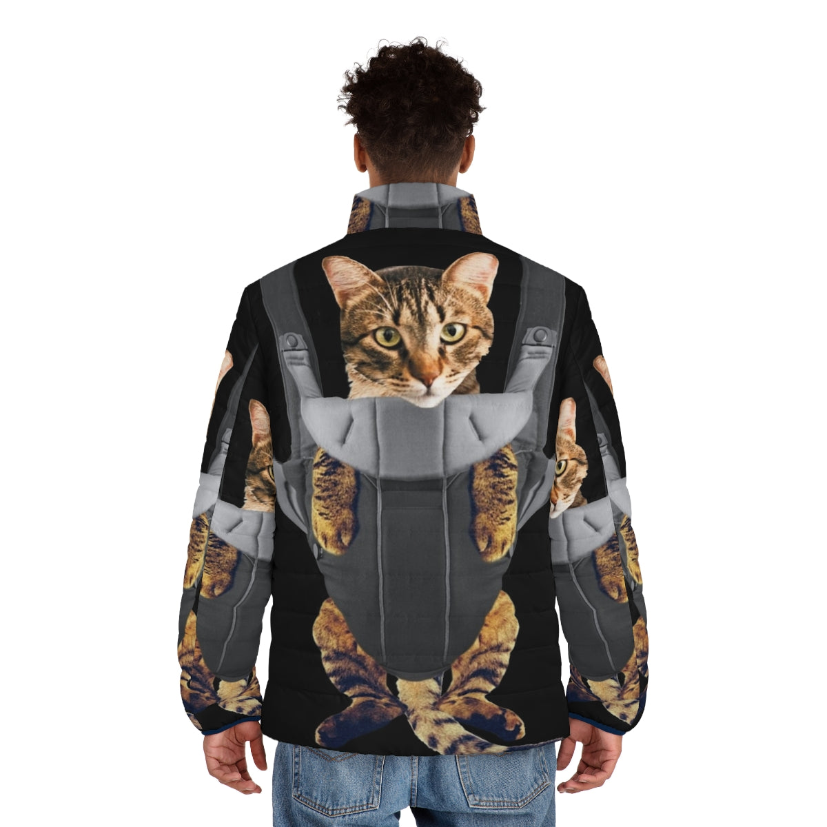 A tabby cat peeking out of a puffer jacket designed to look like a baby carrier. - men back