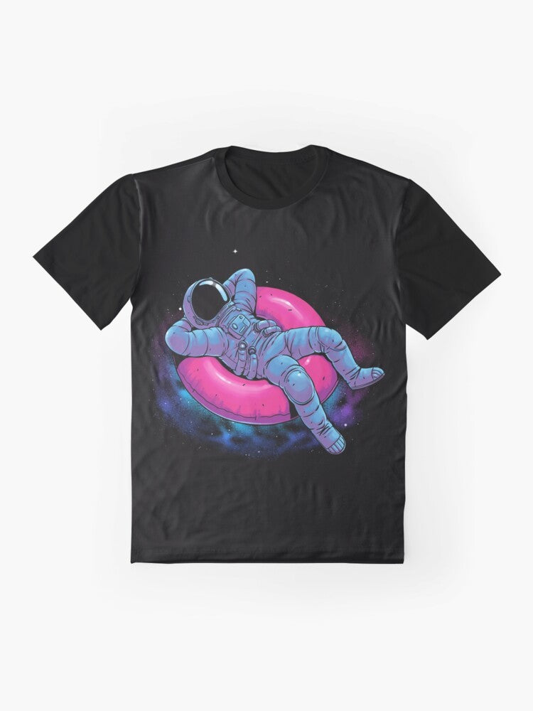 A graphic t-shirt design featuring a floating astronaut in a dreamy, cosmic space scene with stars, nebula, and other celestial elements. - Flat lay